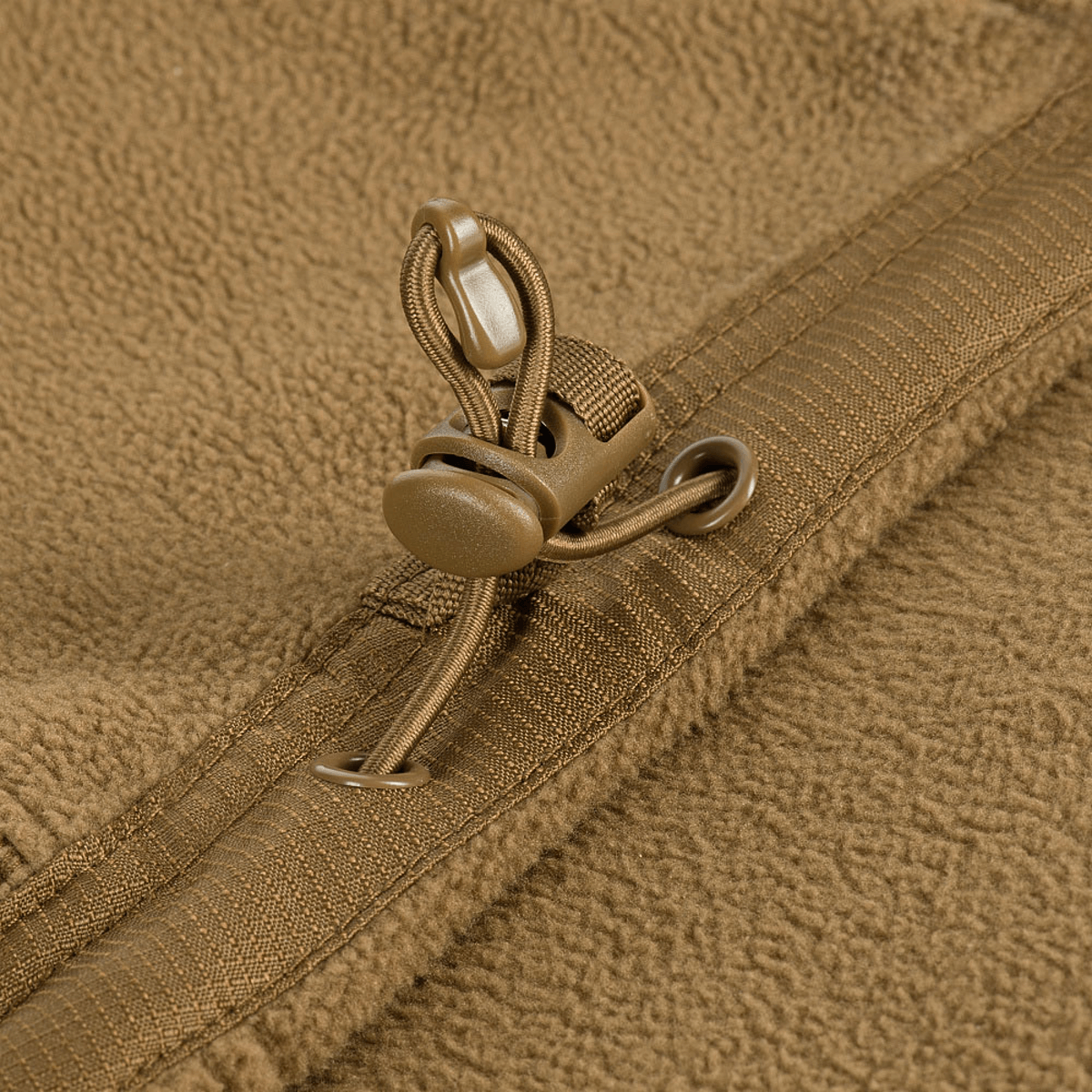 Detalje af lynlås på M-Tac Division Gen.II Windblock Fleecejakke, designet til maksimal varme og vindbeskyttelse.