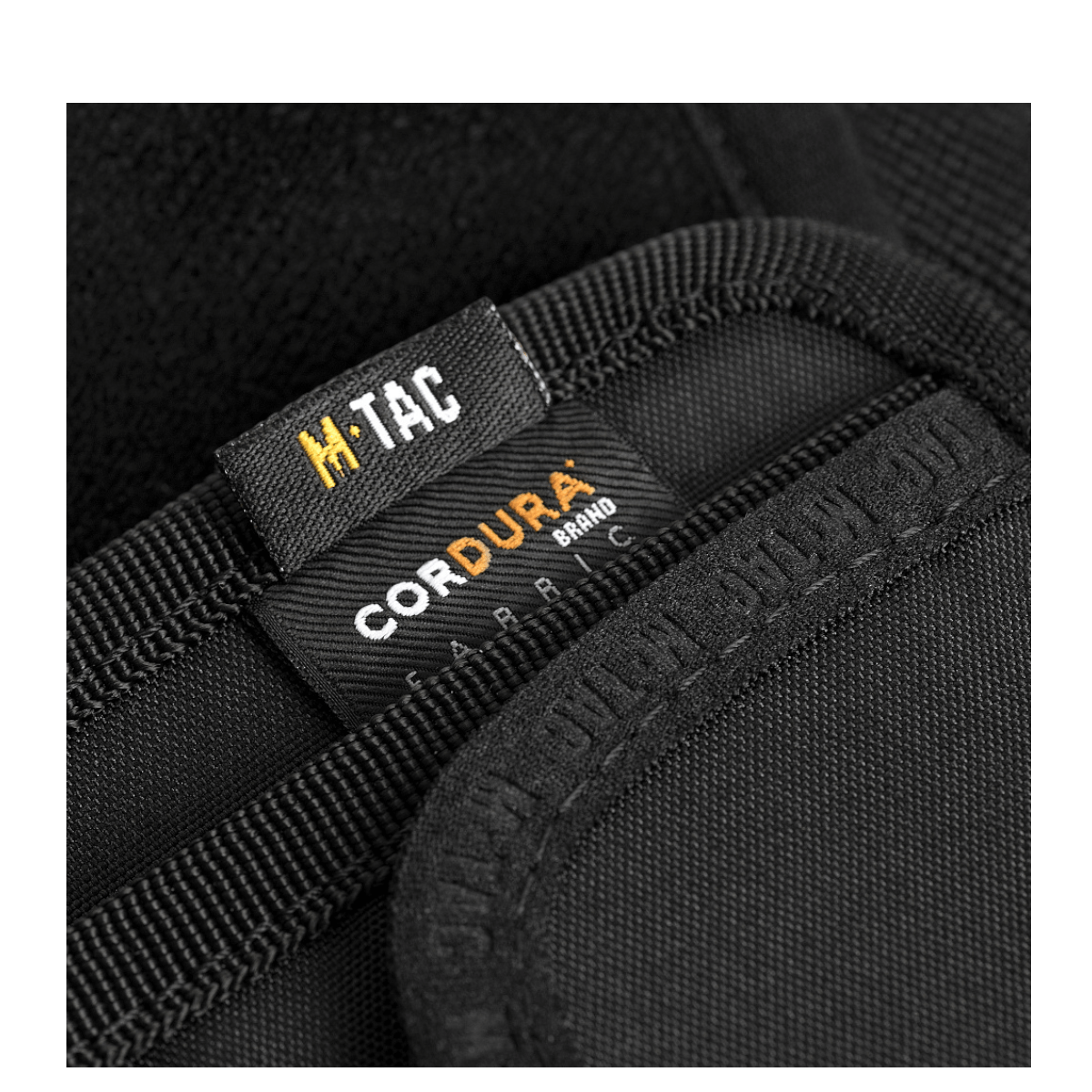 M-Tac Pung med Patch Panel Elite Large i robust 1000D CORDURA® materiale med TEXCE-stropper og YKK-lynlås for ekstra holdbarhed.