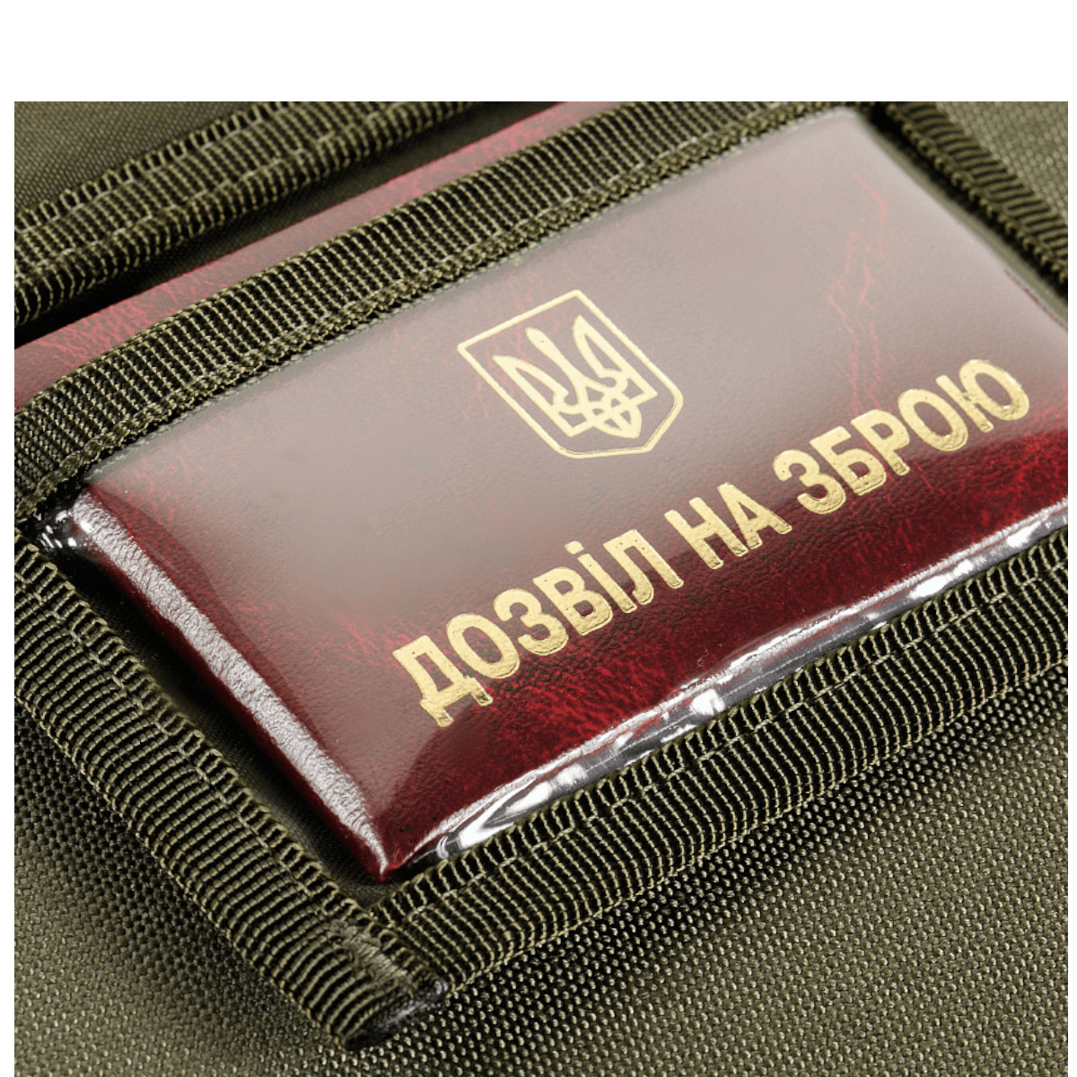 Close-up af M-Tac Pung med Patch Panel Elite Gen. II, viser robust materiale og visitkort med ukrainsk skrift.