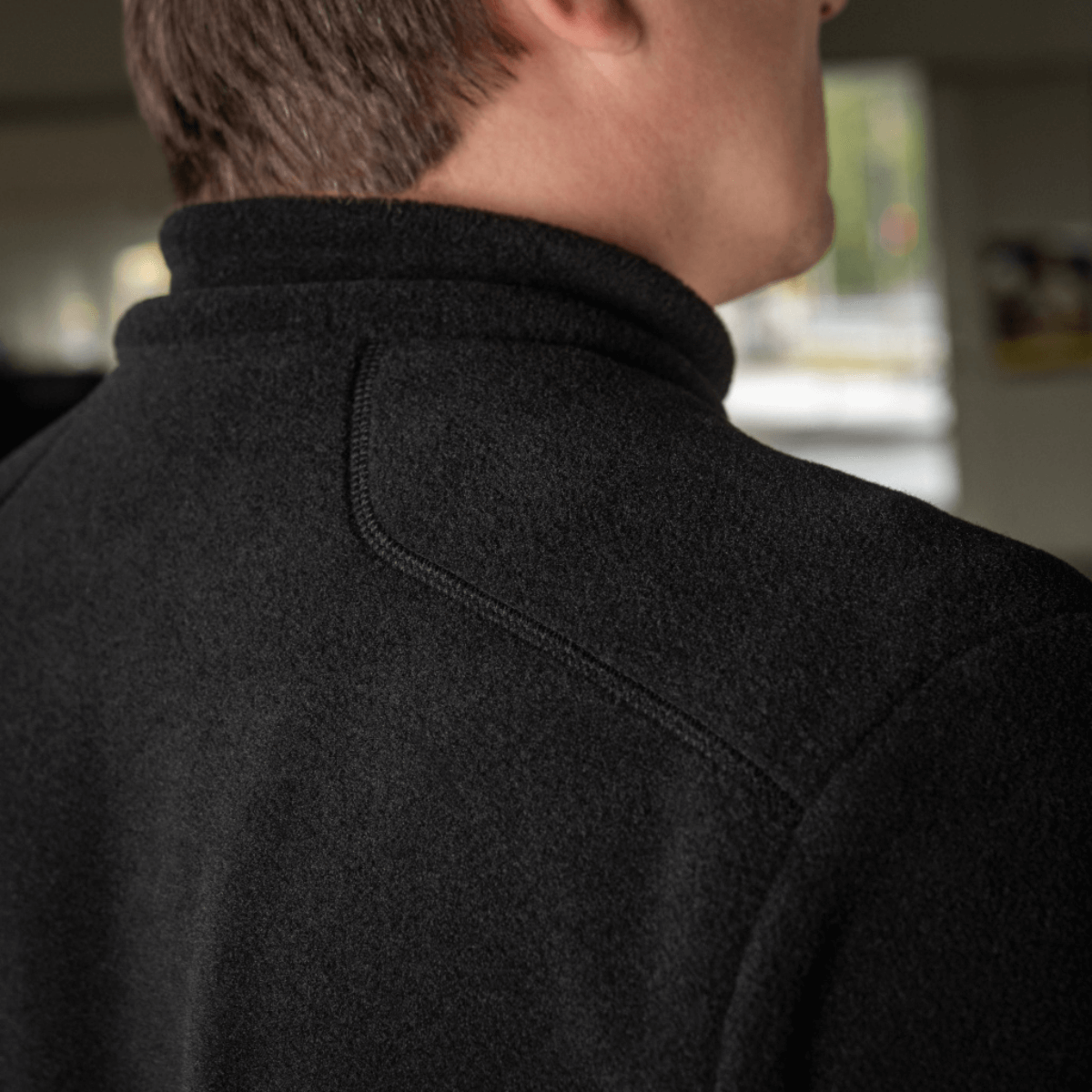 M-Tac Nord Polartec Fleecejakke set bagfra i sort farve, fremstillet af Polartec® 200 Series fleece, designet til varme og komfort.