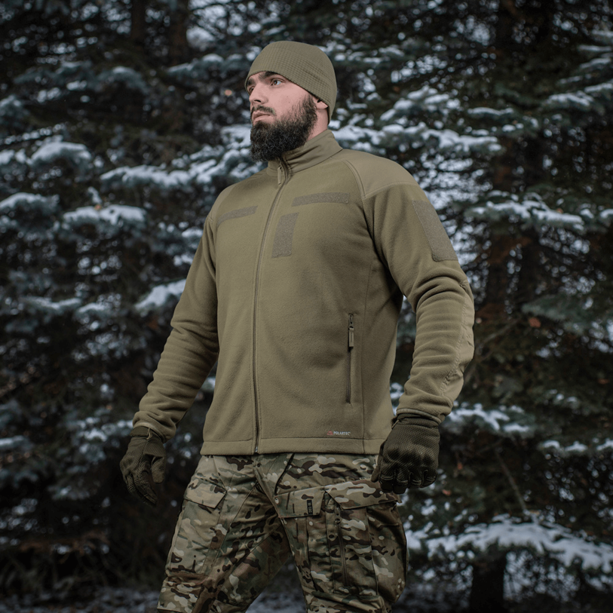 M-Tac Combat Fleece Polartec Jakke til taktisk brug i vintermiljø, med avanceret design og funktionelle materialer.