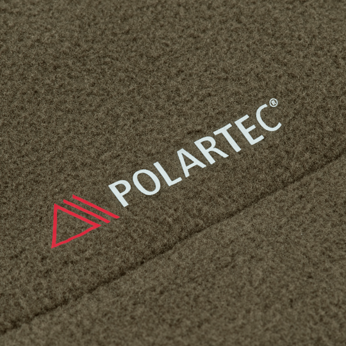 M-Tac Combat Fleece Polartec Jakke med Polartec® materiale i olivengrøn farve, der viser tekstur og mærkelogo.