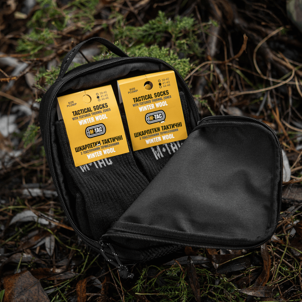 M-Tac Sokker Winter Wool i en sort taske, perfekte til kolde vejrforhold med merinould for varme og komfort.