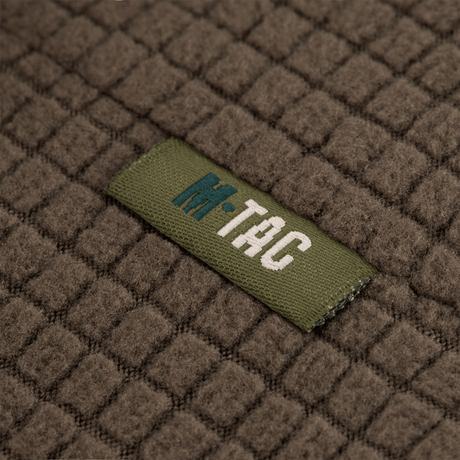 M-Tac Rip-Stop Fleece Hjelmliner i brun med anti-pilling egenskaber. Ideel til koldt vejr og langvarig udendørs brug.