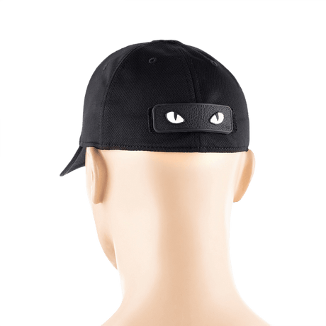 M-Tac Cat Eyes 3D PVC-patch på svart hatt, ljusreflekterande och enkel fästning via Velcro, idealisk för militär och utomhusbruk.