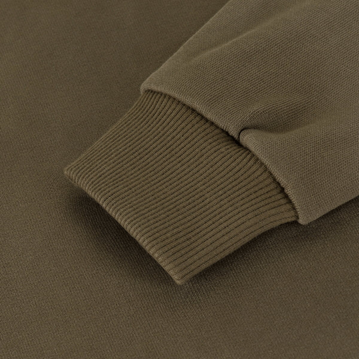 Nærbillede af elastisk manchet på M-Tac Cotton Raglan Hard Hoodie, komfortabel og varm fleecefor, perfekt til efterår og vinter.