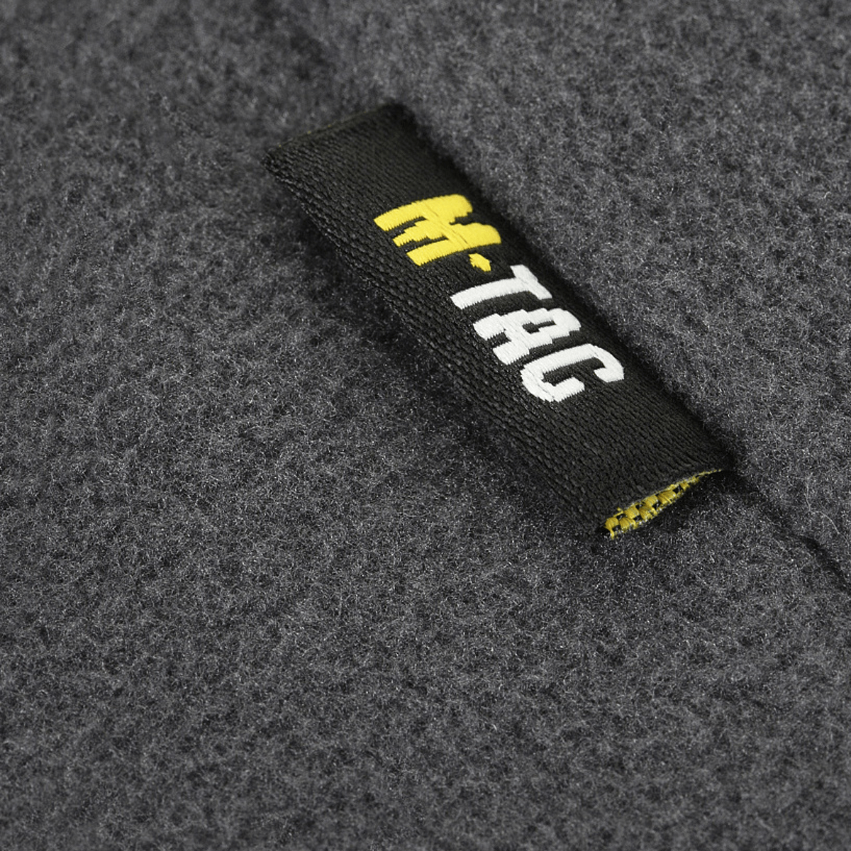 M-Tac Delta Polartec Fleecejakke detalje af materiale og logo på etiketten