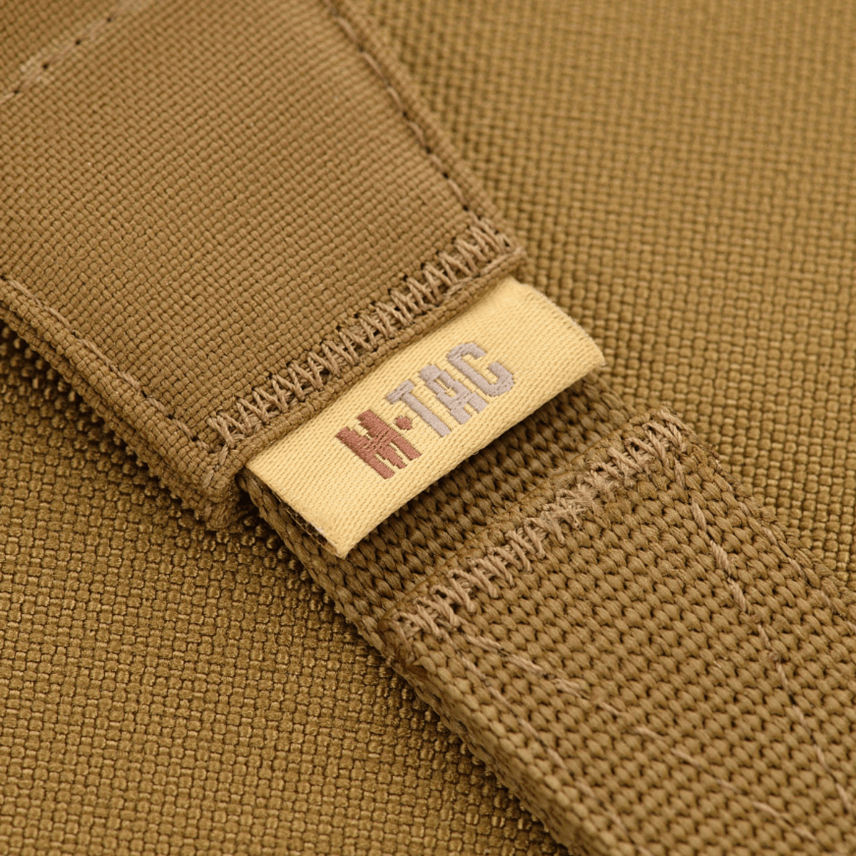 M-Tac Våbenbælte med To Punkter i holdbart materiale og kvalitetsspænder fra Woojin Plastic, designet til krævende forhold.