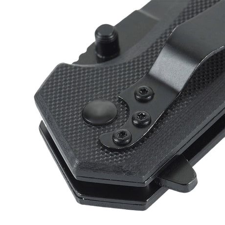 Detalj av M-Tac Outdoor & Militär fällkniv - Type 5 med aluminiumhandtag och halksäkra G10-kompositgreppytor.