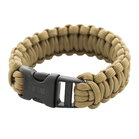 M-Tac Paracord-armband i beige med svart spänne, lämpligt för friluftsliv och överlevnad, robust och stilrent design.