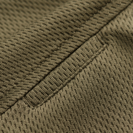 M-Tac Polo Elite Tactical Coolmax detaljer med fugttransporterende Coolmax® stof, ideel til politi og sikkerhedsuniformer.
