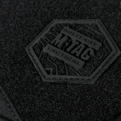 Närbild av M-Tac Sling pistolväska Elite Hex med Velcro-logotyp i svart Cordura-material