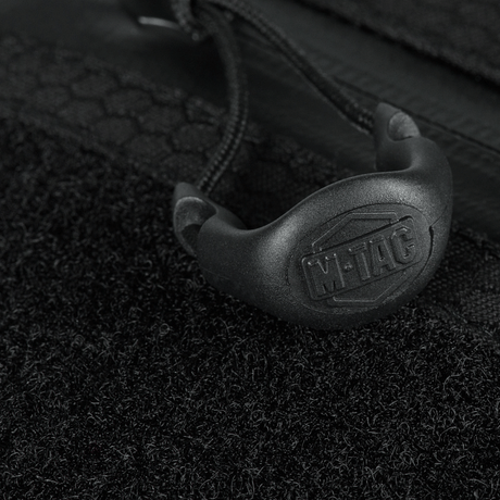 Detaljbild av M-Tac Sling pistolväska Elite Hex med Velcro, nära blixtlåset.