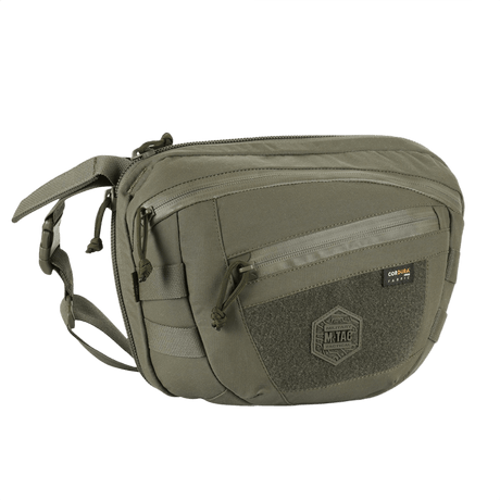 M-Tac Sphaera Hardsling Bag Large Elite med Velcro i grön Cordura, kompakt design med MOLLE-system och justerbar axelrem.