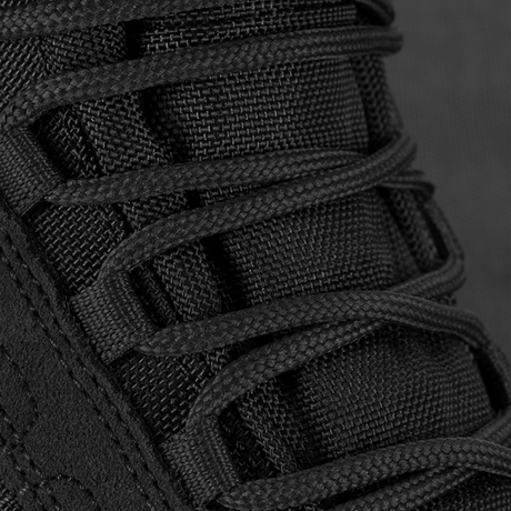 Närbild av snörning på M-Tac Taktiska Demi-Season Stövlar Pro Line i svart Cordura och suede-material.