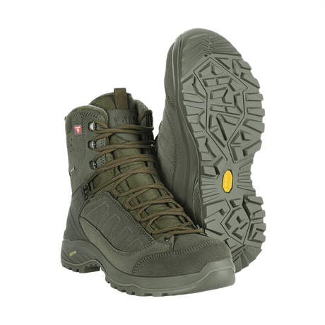 M-Tac Tactical Vinterstövlar i slitstarkt mocka med Vibram-sula och Primaloft-isolering, idealiska för kalla och krävande miljöer.