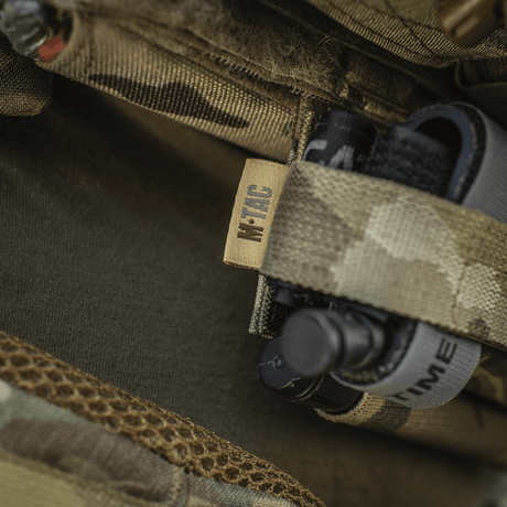M‑Tac Tourniquet Pouch Elastic Gen.5 fastgjort til taktisk udstyr, lavet af Cordura 500D, hurtig adgang fra venstre eller højre side.