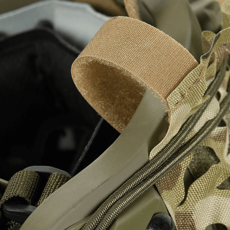 M‑Tac Vilha Hjelmcover FAST i Cordura 500D med velcro-stropper og camouflage design til FAST-hjelme, Multicam mønster vises tæt på.