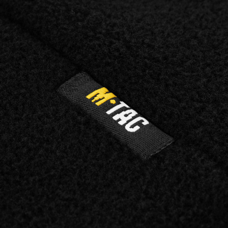 Nærbillede af mærket på M-Tac Watch Cap Elite Fleece Beanie Hat Slimtex, lavet af slidstærk fleece med Slimtex termolag.