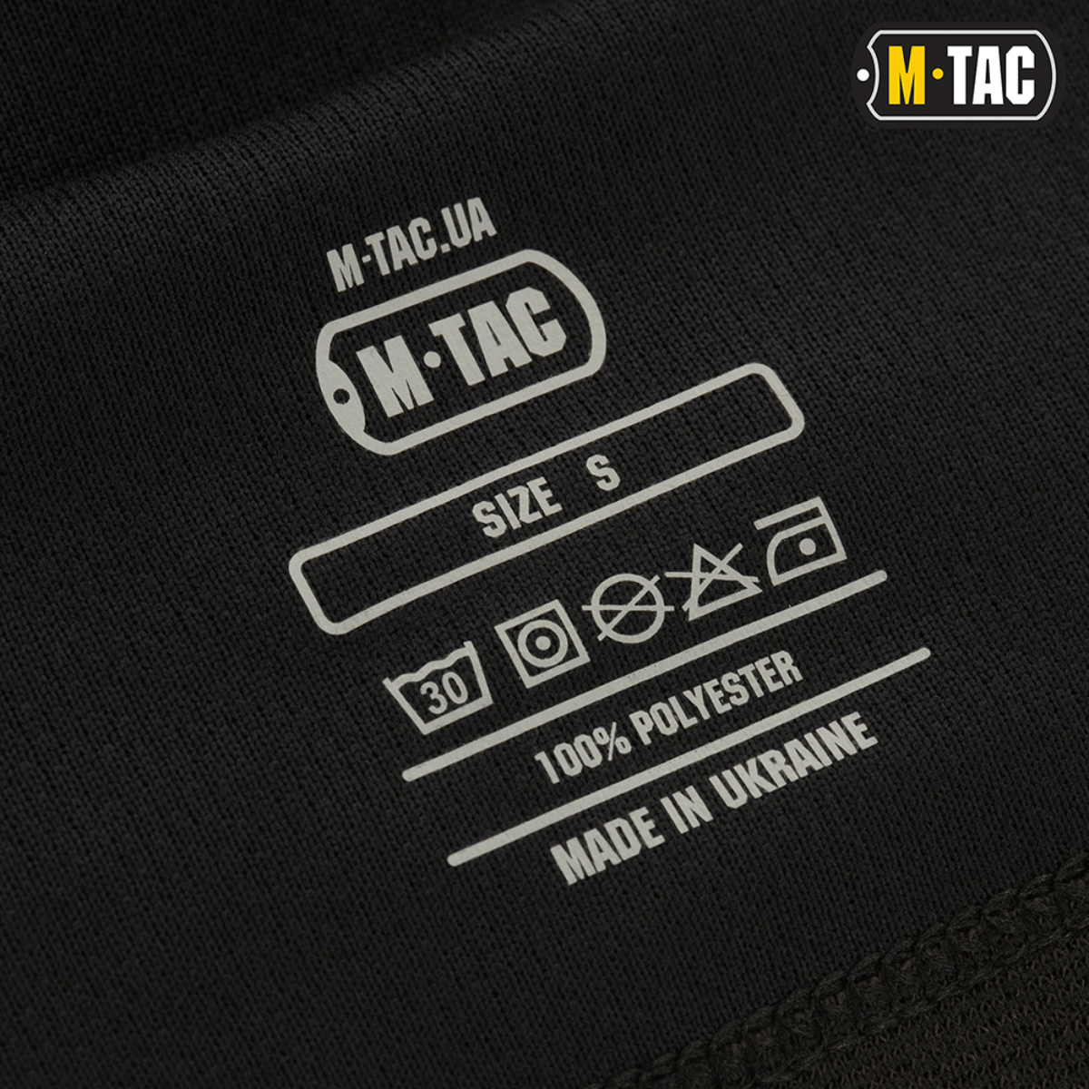 M-Tac Sweater-Ninja-Balaclava Premium vaskeinstruktioner og mærkat. Størrelse S, 100% polyester, fremstillet i Ukraine.