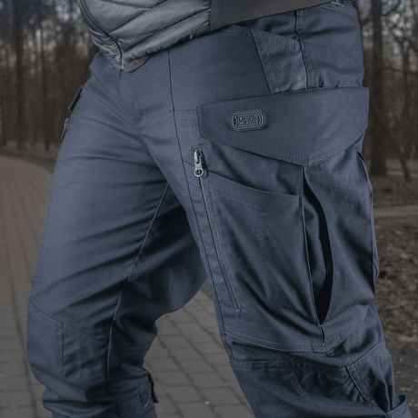 M-tac Taktiske Bukser Conquistador Gen. I Flex til udendørsaktiviteter, lavet af rivestærkt polycotton Rip-stop Flex stof.