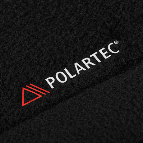 Nærbillede af M-Tac Combat Fleece Jakke Dame – Polartec og taktisk, der viser Polartec® mærkelogo på materialet.