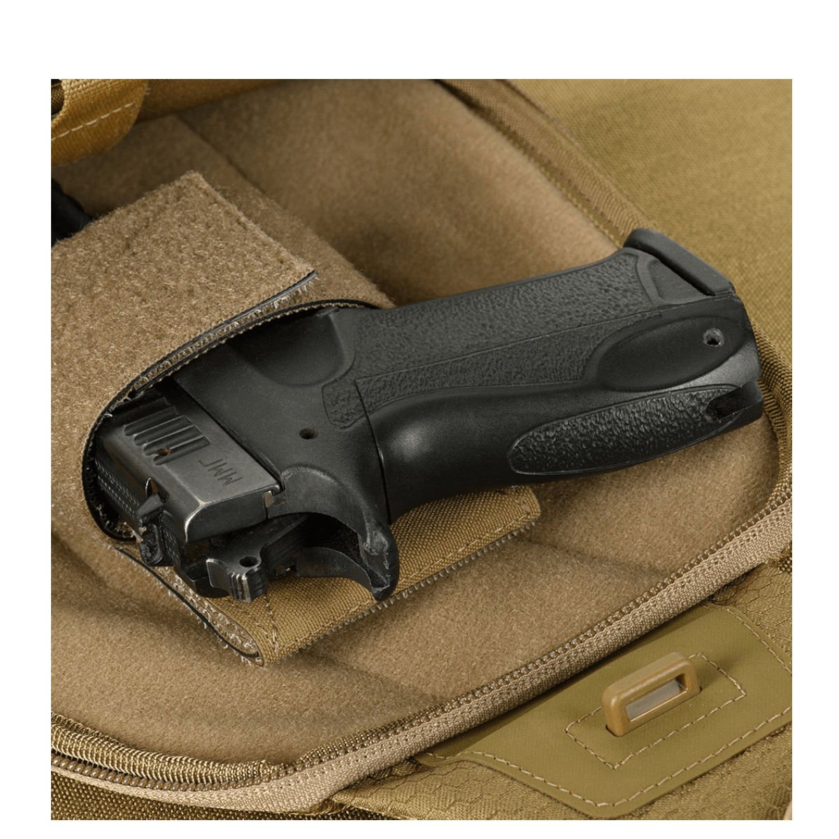 M-Tac Buckler Taske Elite Hex taske med skjult våbenbæring, MOLLE-system og Hex-Cordura materiale i sort og olivenfarver.