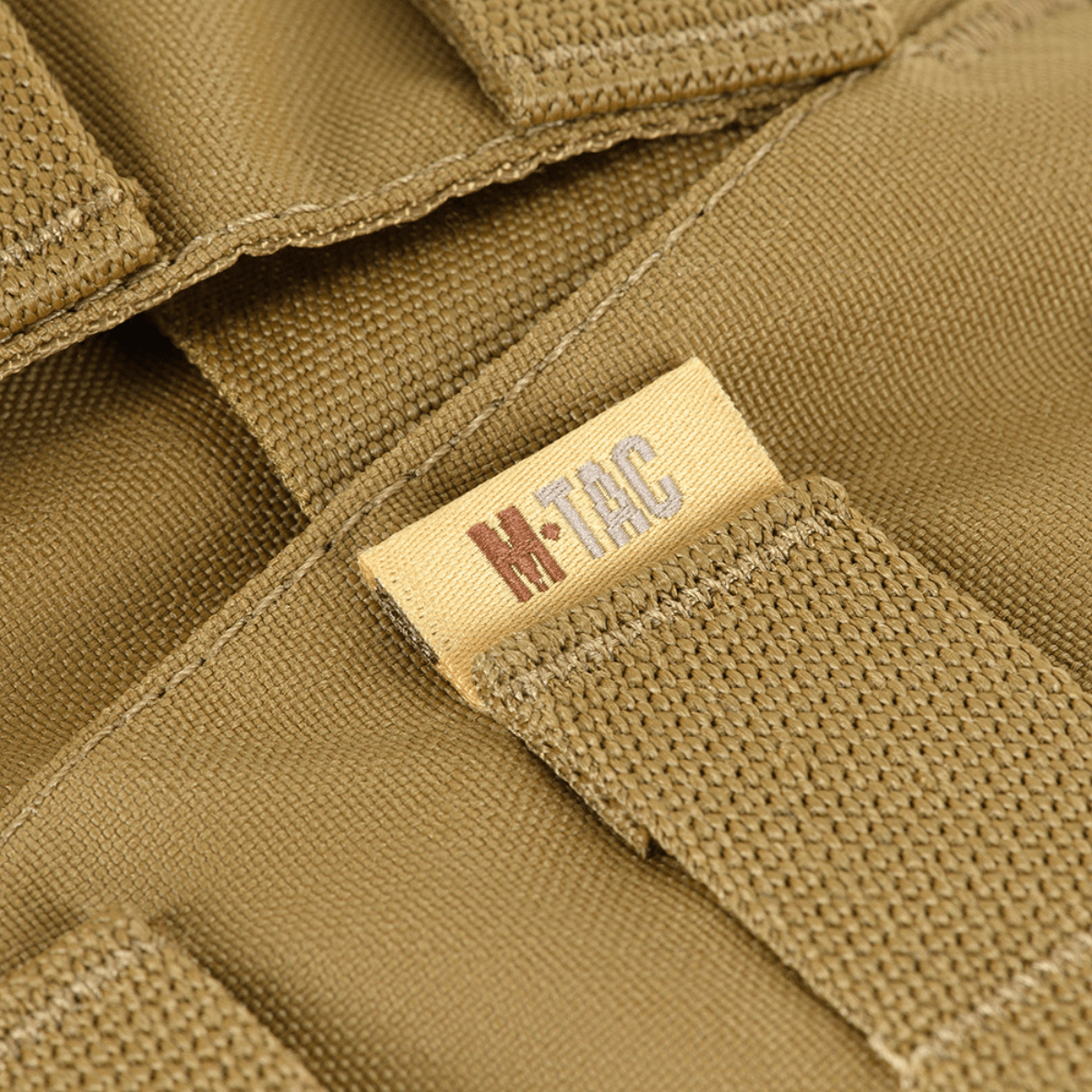 Nærbillede af M-Tac War Belt ARMOR lavet af slidstærkt Cordura 500D, med MIL-SPEC MOLLE-webbing til taktisk udstyrshåndtering.