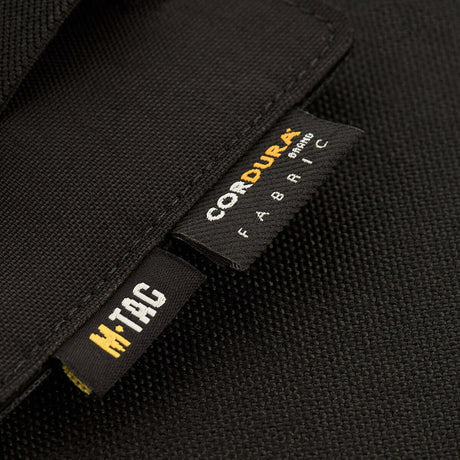 Nærbillede af M-Tac Double Mag Pouch Hook Backed Magazine med Cordura-stofmærke