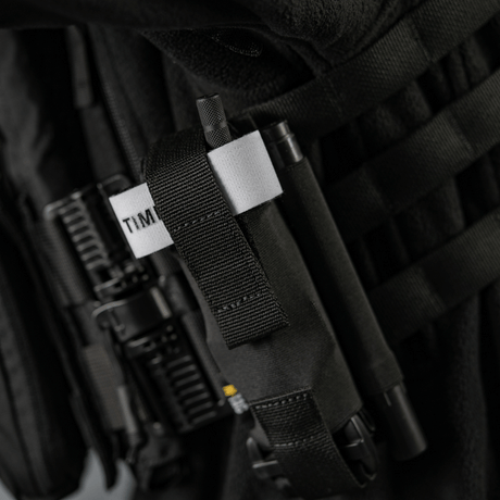 M-Tac Elastisk Tourniquet Pouch Molle Gen.III i sort Cordura med elastikdetaljer til sikker fastgørelse af C-A-T tourniquet.