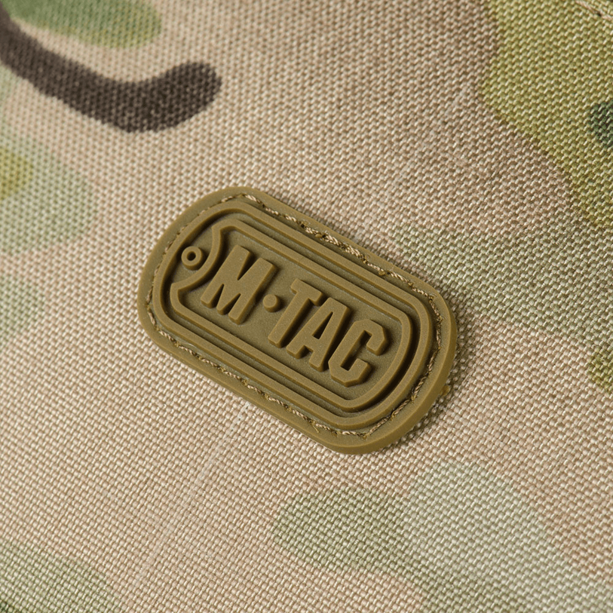 M‑Tac Cross Bag Elite Hex logo på Cordura 500 materiale, designet til hverdagsbrug og taktisk udstyr.