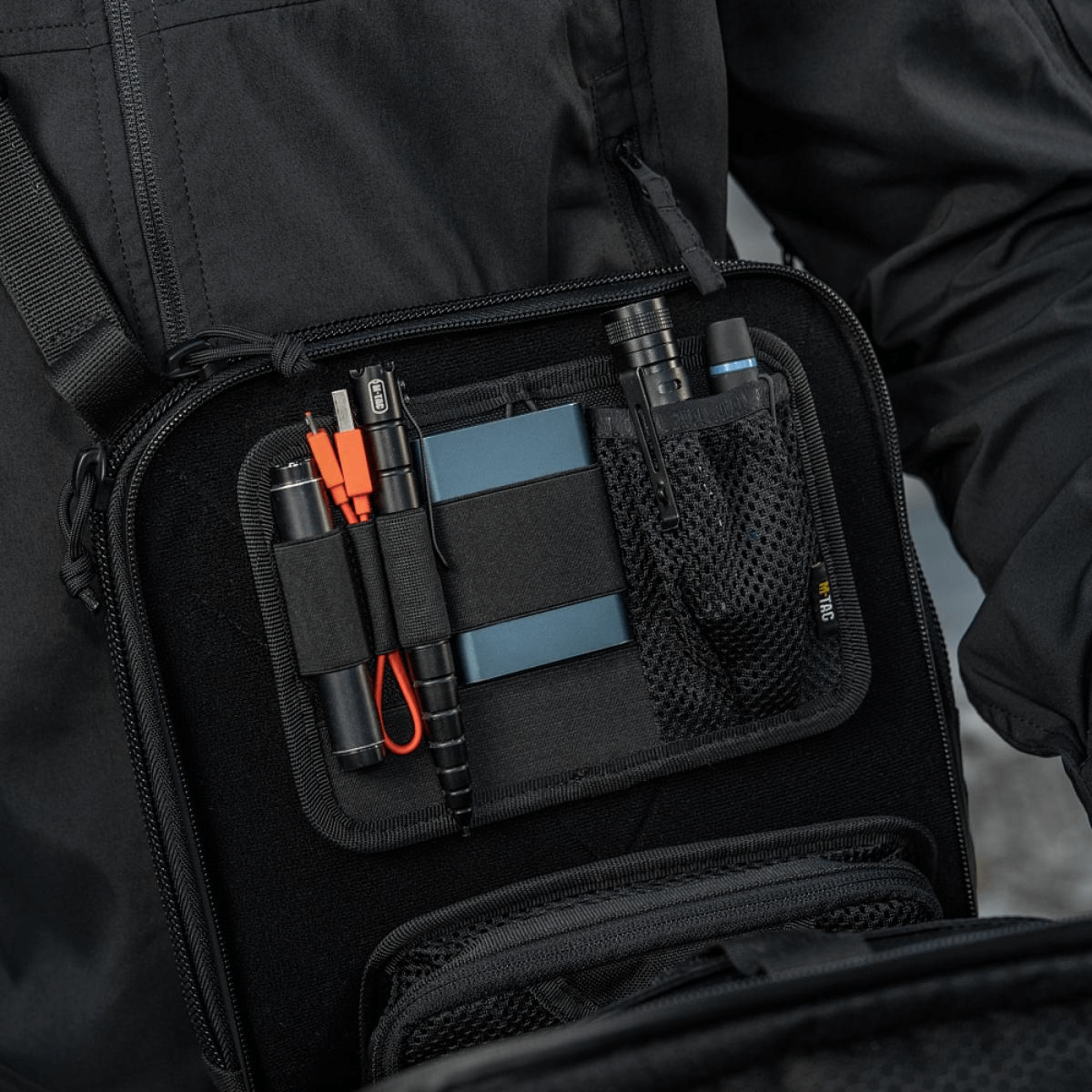 M-Tac Tablet Bag Laser Cut Hex with organized compartments for EDC tools and accessories in Cordura material.