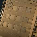 Nærbillede af M-Tac Tablet Bag Laser Cut Hex med Cordura Hex og MOLLE frontpanel design.