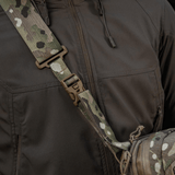 Close-up of person wearing M-Tac Tablet Bag Laser Cut Hex with camo strap over shoulder