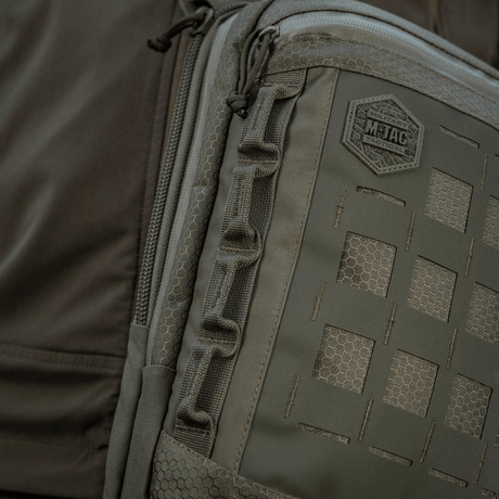 M-Tac Tablet Bag Laser Cut Hex i Cordura, med Laser Cut MOLLE-panel til ekstraudstyr og rum til skjult våben.