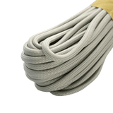 Grå M‑Tac Paracord 550 Type III 15 m nylonkordel, ideel til friluft, reparationer og nødbrug, med en brudstyrke på 240 kg.