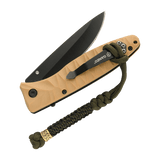 M-Tac Knife Lanyard Scandinavian Granule attached to a folded pocket knife with tan handle and black blade, showcasing paracord braid.