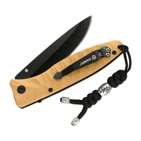 M-Tac Zeus Stainless Steel Lanyard på en kniv, dekoreret med rustfri stålkugle, flettet paracord til hurtig tilgængelighed og anvendelighed.