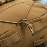 Nærbillede af M-Tac Rygsæk Sturm Elite Gen.II med elastisk snøring og MOLLE system, fremstillet i slidstærkt Cordura materiale.