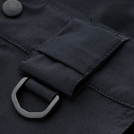 Detaljebillede af M-Tac Shorts Aggressor Gen.II Flex med D-ring og rip-stop materiale.