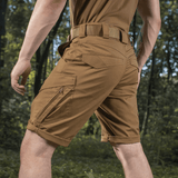 M-Tac Shorts Aggressor Gen.II Flex i naturen, holdbare og taktiske shorts til træning og udendørs aktiviteter.