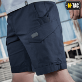 M-Tac Shorts Aggressor Short med taktiske lommer, ideel til bybrug og udendørs aktiviteter, vises i navy blå farve til mænd.