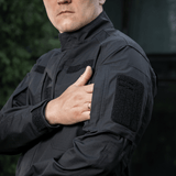 M-Tac Jakke Patrol Flex med velcro-paneler til ID- og navn tags, perfekt til taktisk brug med ventilationsøjer og forstærket skulder.