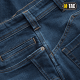 Detalje af M-Tac Tactical Gen.I Regular Fit jeans med kraftig syning og klassisk blå denim farve.