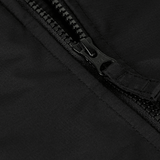 Nærbillede af lynlås på M-Tac Alpha Gen.III Pro Vinterjakke, fremhæver vandtæt nylonmateriale og robust design.