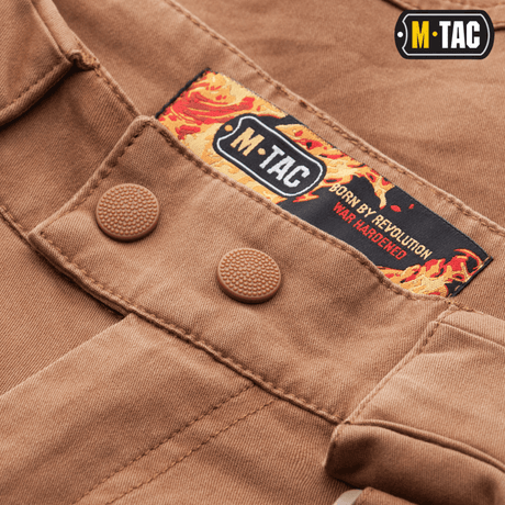 M-Tac Bukser Aggressor Vintage i tyk bomuldsstof og YKK hardware, detaljeret syning, stilfuldt og funktionelt design til hverdagsbrug.