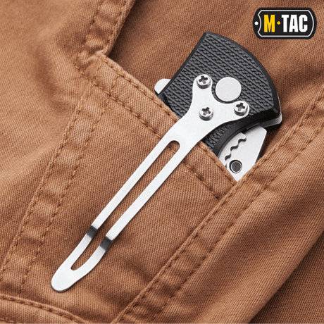 M-Tac Bukser Aggressor Vintage med lomme til værktøj på brun baggrund, viser robusthed og stil.