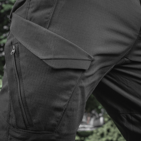 Close-up of M-Tac Aggressor Summer Flex Shorts pocket design in black, showcasing tactical style and durable Flex Rip-Stop fabric.