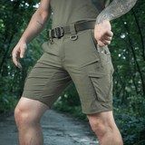 M-Tac Aggressor Summer Flex Shorts i brug i naturen, letvægts- og åndbare shorts til træning og aktiviteter udendørs.