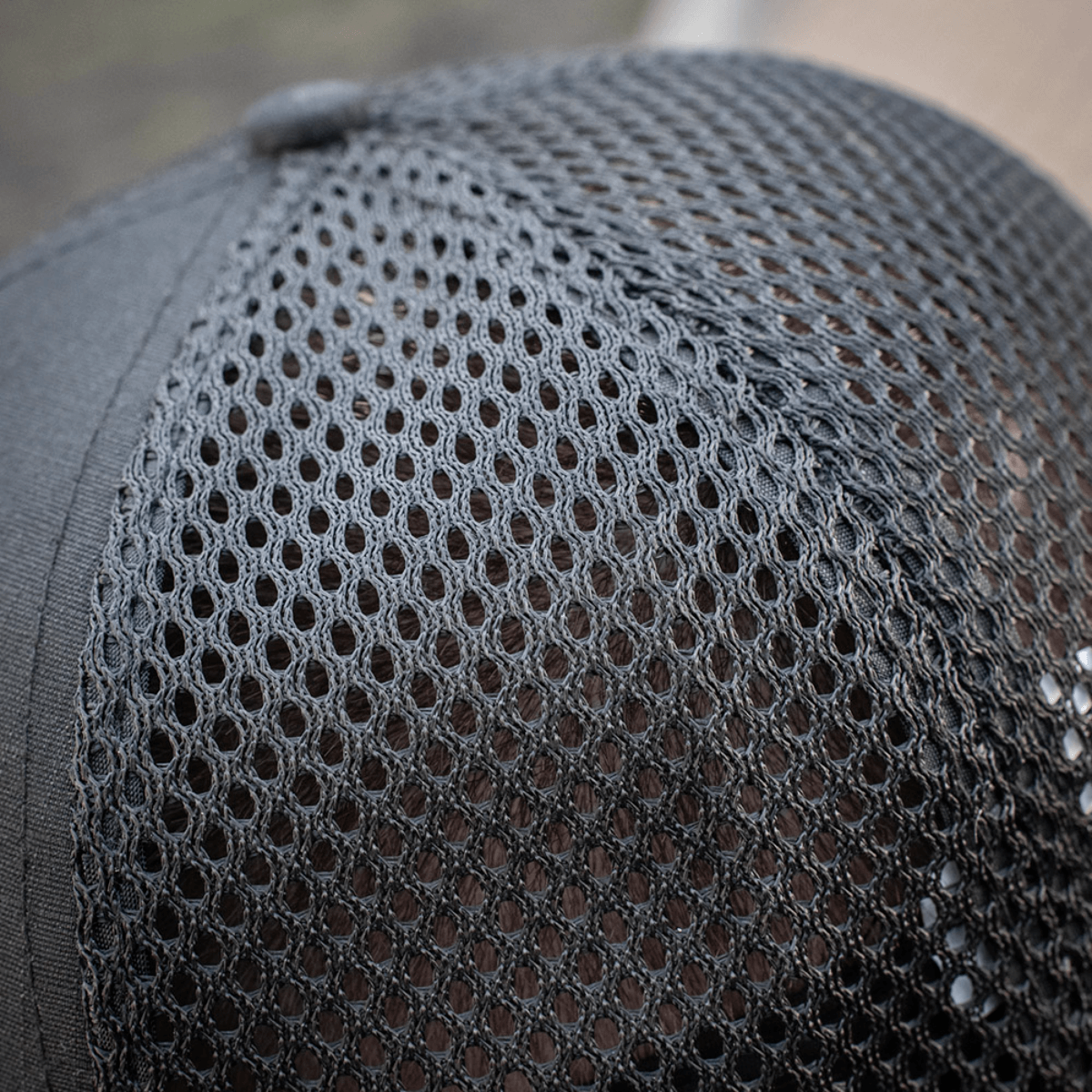 Nærbillede af mesh panel på M-Tac Mesh Flex Ripstop Baseball Cap, viser ventilationsdesignet for optimal komfort udendørs.
